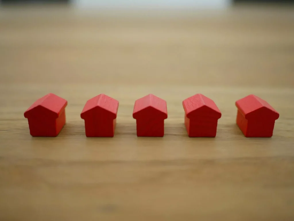 Image of Origami Of Houses In A Row | Get Financing For Commercial Property Loan | Freshwater Financial Services